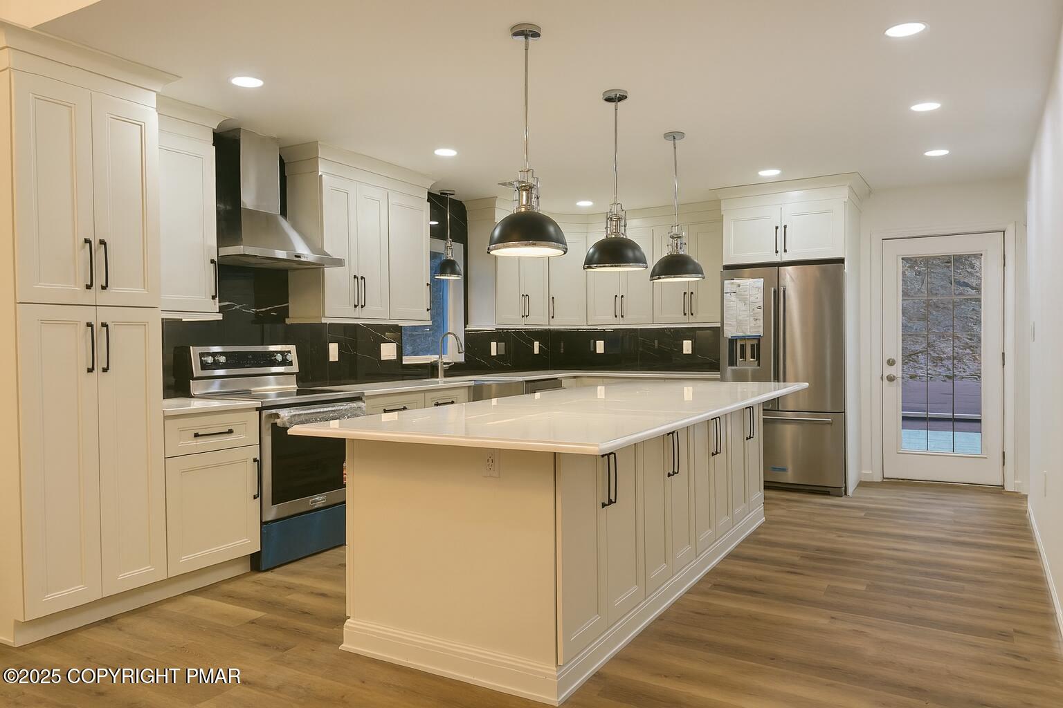 1131 Mink Court Bushkill, PA 18324 - Photo 8 of 63 8 Kitchen Island & Patio Door