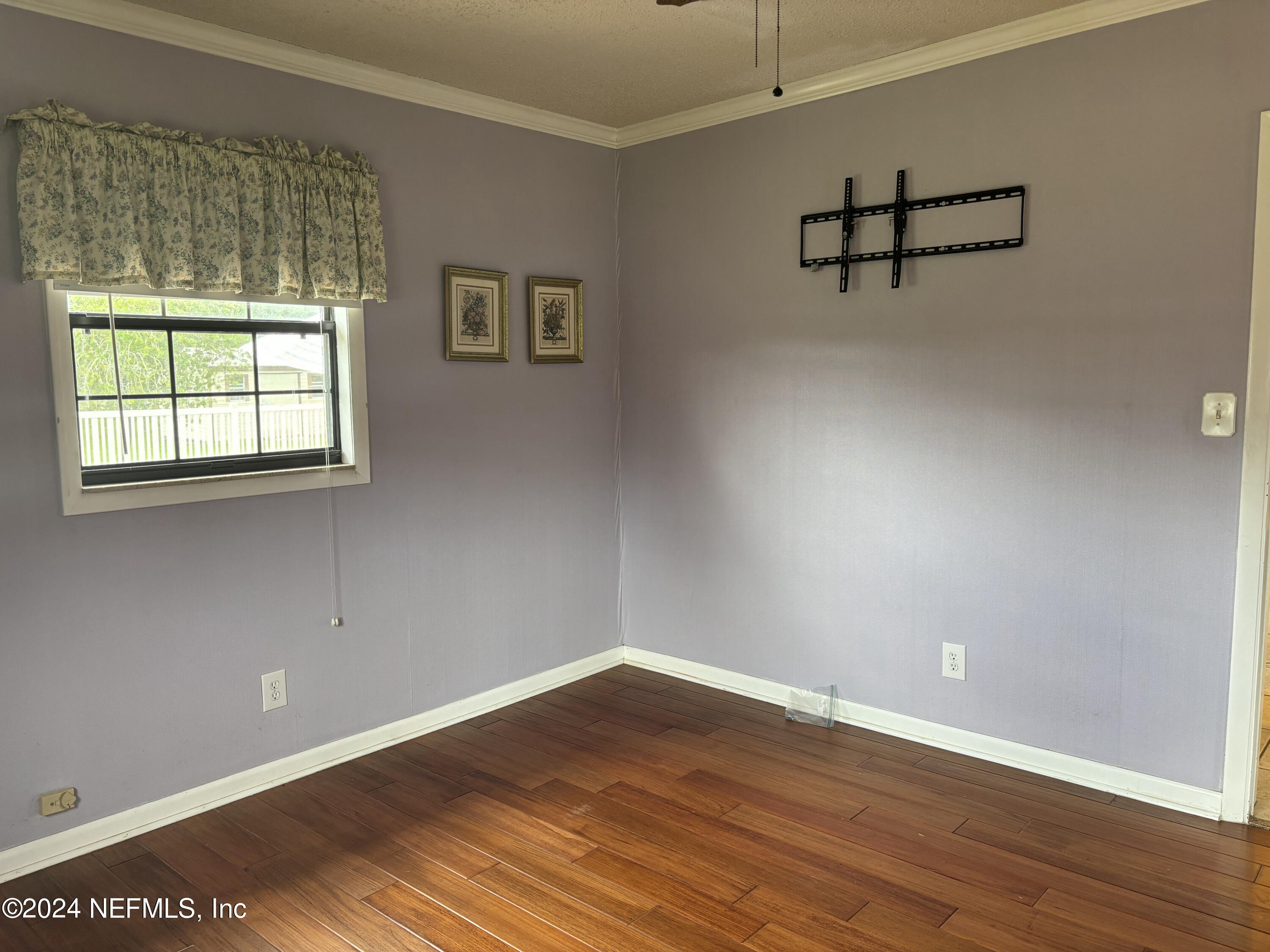 2700 New Berlin Road Jacksonville, FL 32226 - Photo 21 of 42 an empty room with wooden floor and windows
