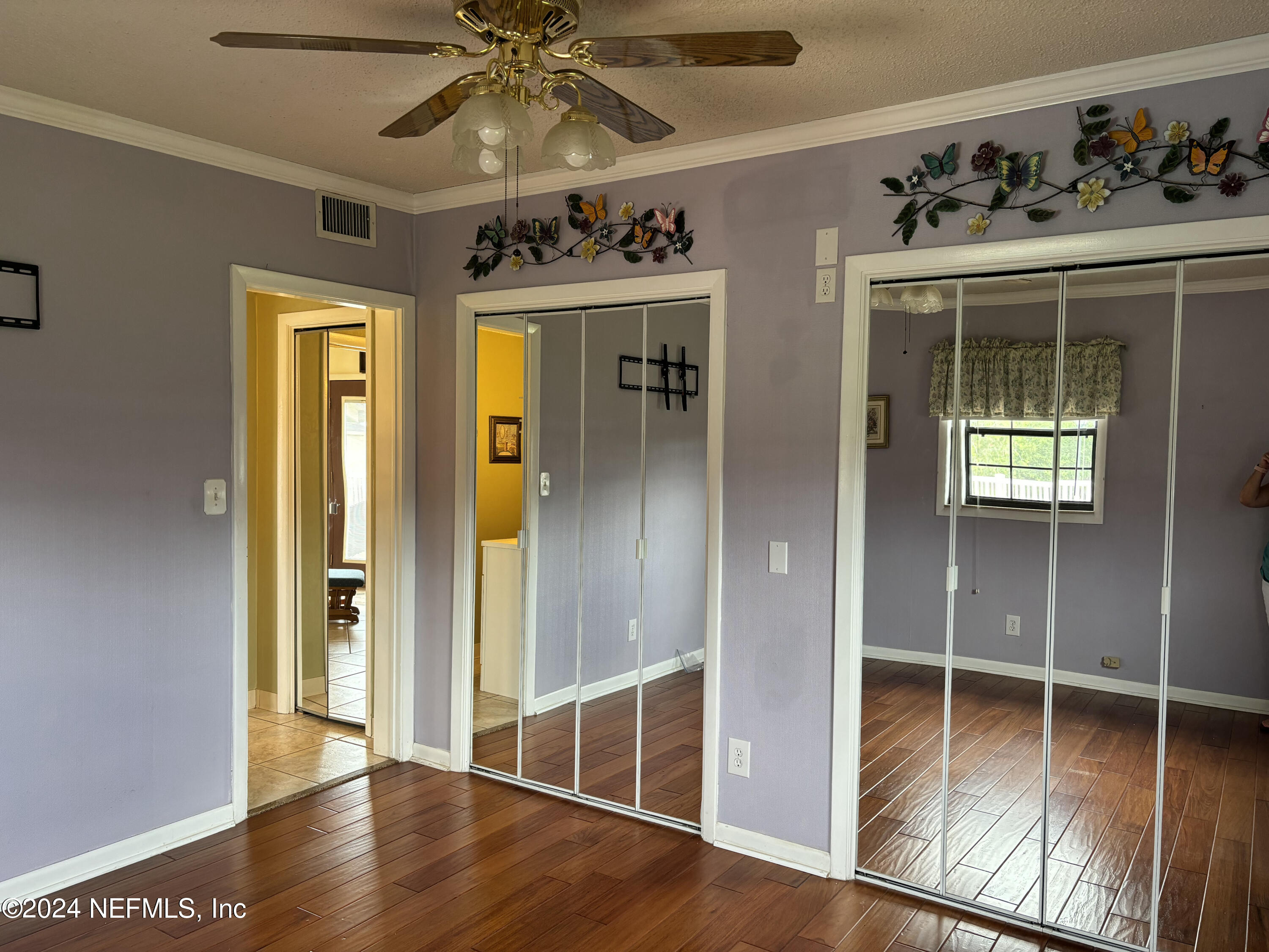 2700 New Berlin Road Jacksonville, FL 32226 - Photo 22 of 42 a view of a hallway with wooden floor and entryway