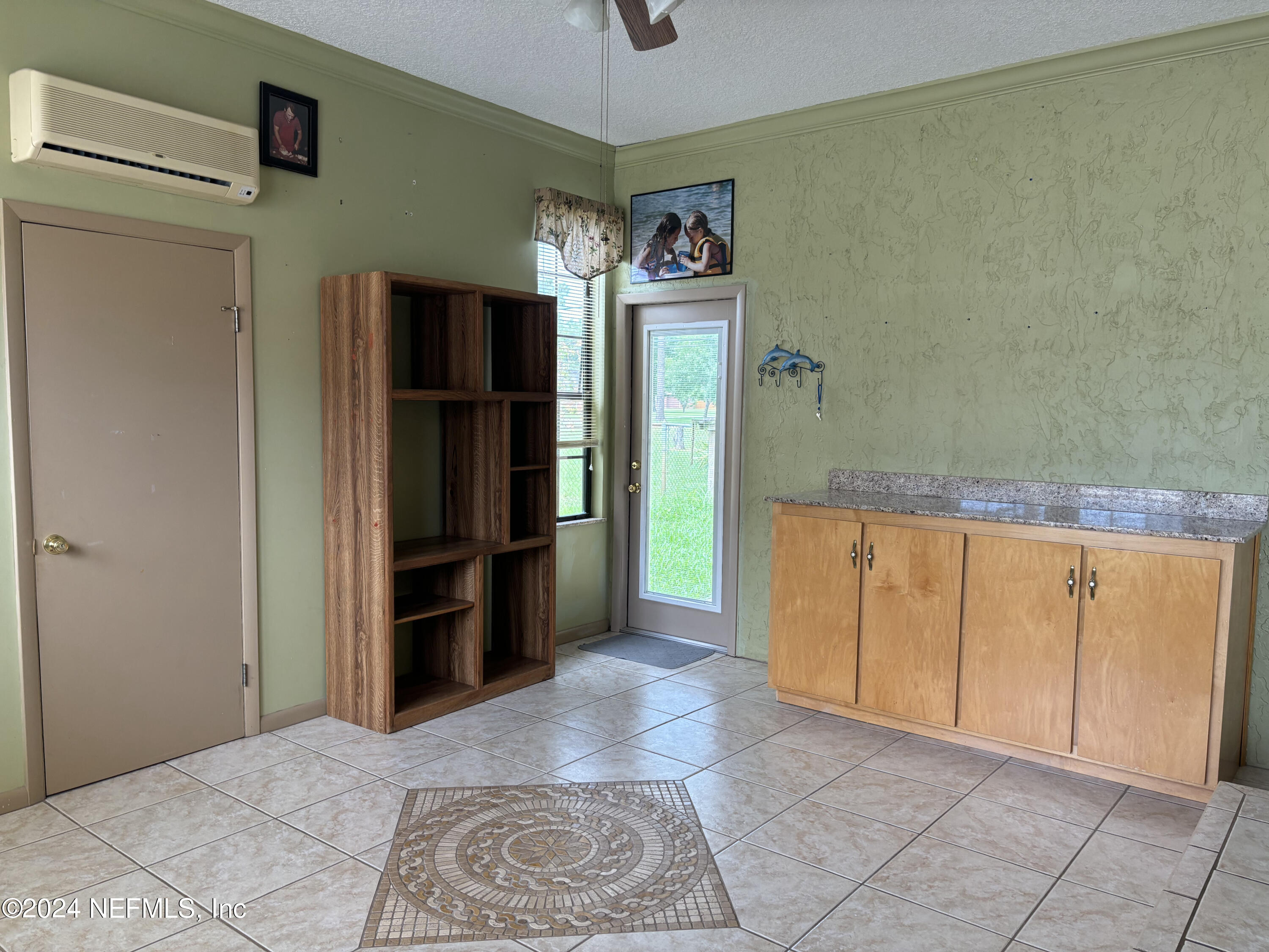 2700 New Berlin Road Jacksonville, FL 32226 - Photo 25 of 42 a view of a kitchen with refrigerator and cabinet