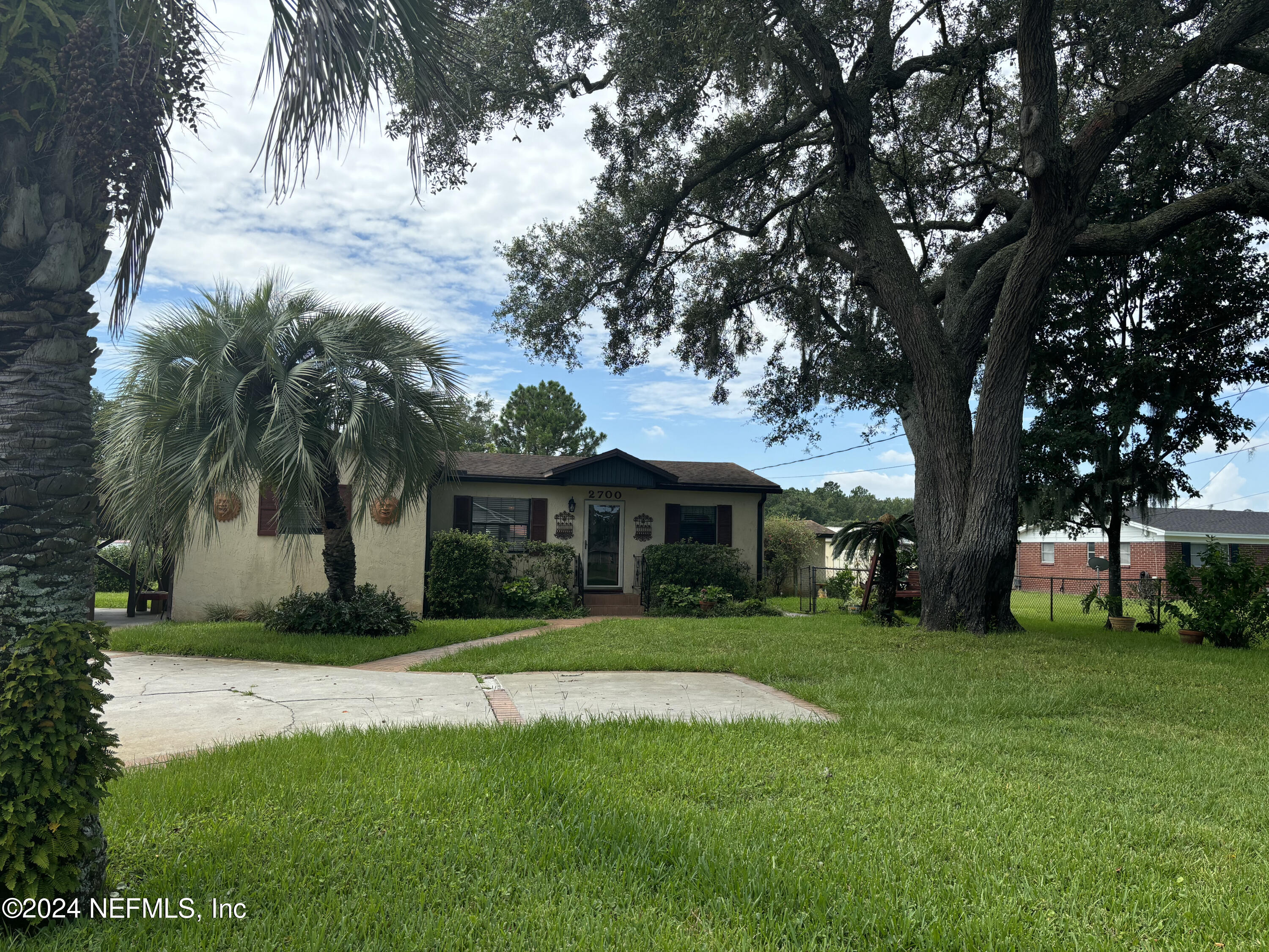 2700 New Berlin Road Jacksonville, FL 32226 - Photo 3 of 42 a front view of house with yard and green space