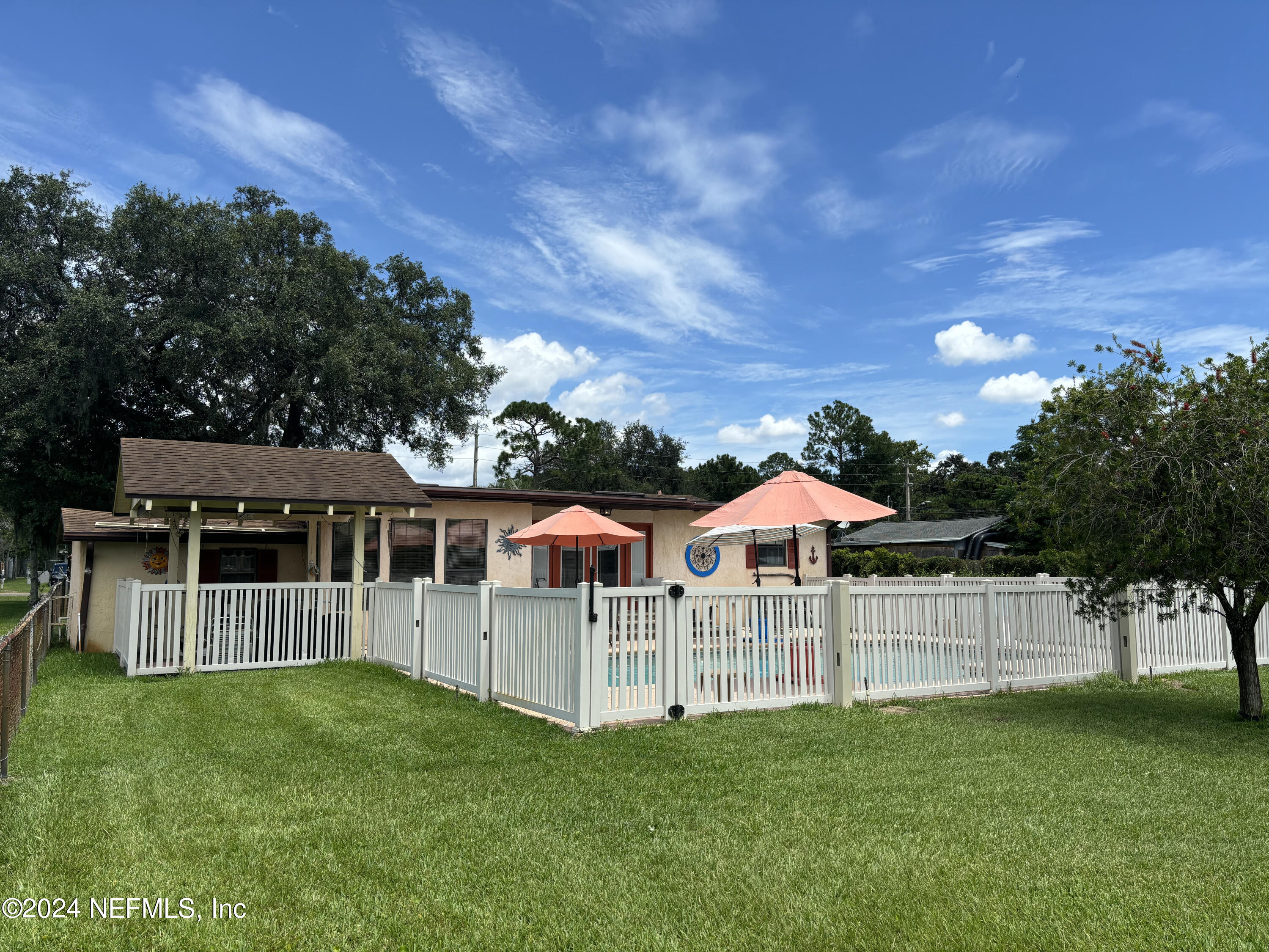 2700 New Berlin Road Jacksonville, FL 32226 - Photo 35 of 42 a view of a house with a yard and deck