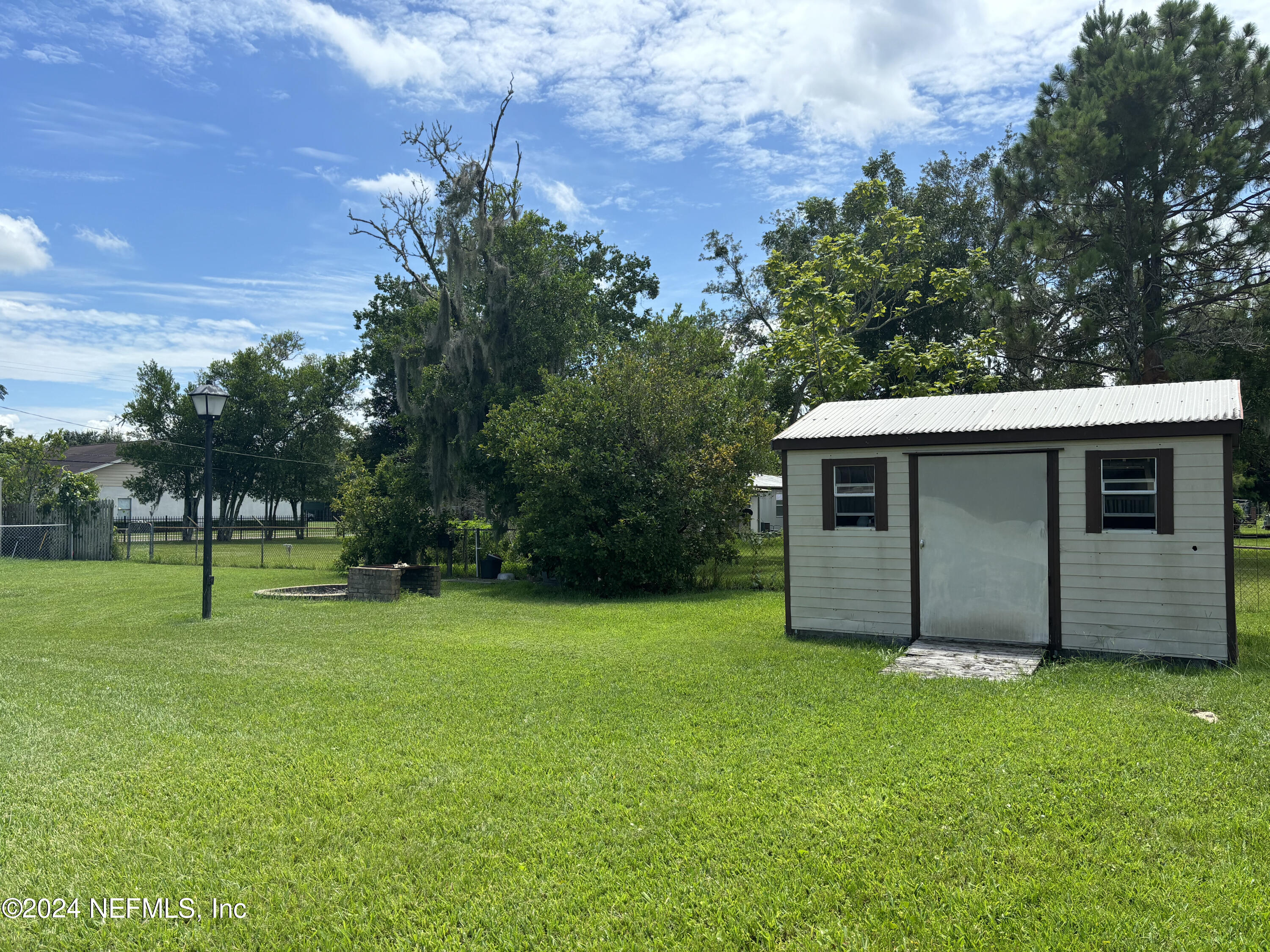 2700 New Berlin Road Jacksonville, FL 32226 - Photo 39 of 42 a view of a backyard with a garden