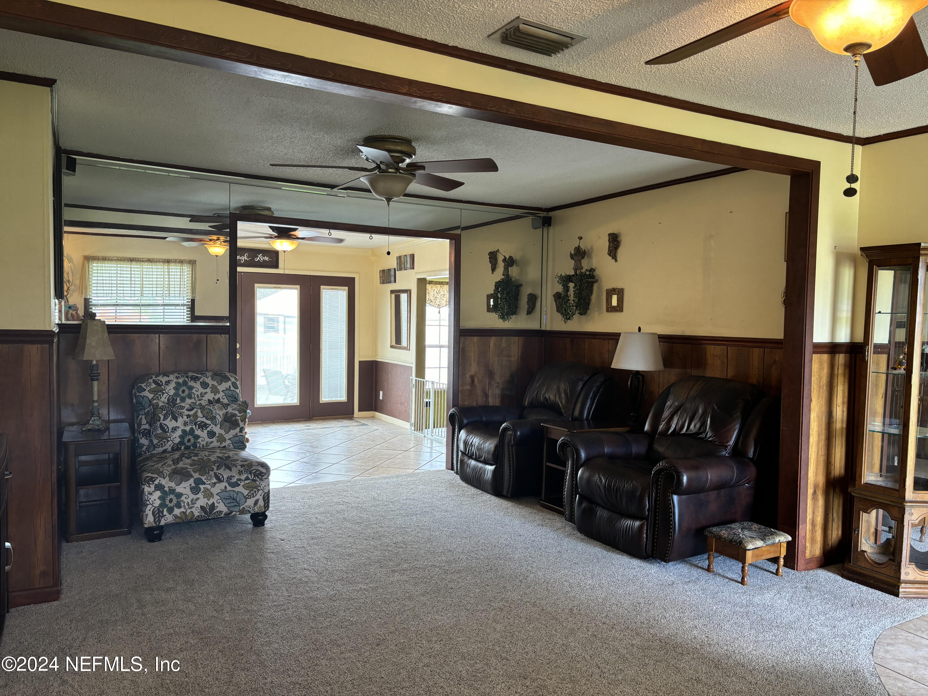 2700 New Berlin Road Jacksonville, FL 32226 - Photo 6 of 42 a living room with furniture and a fireplace