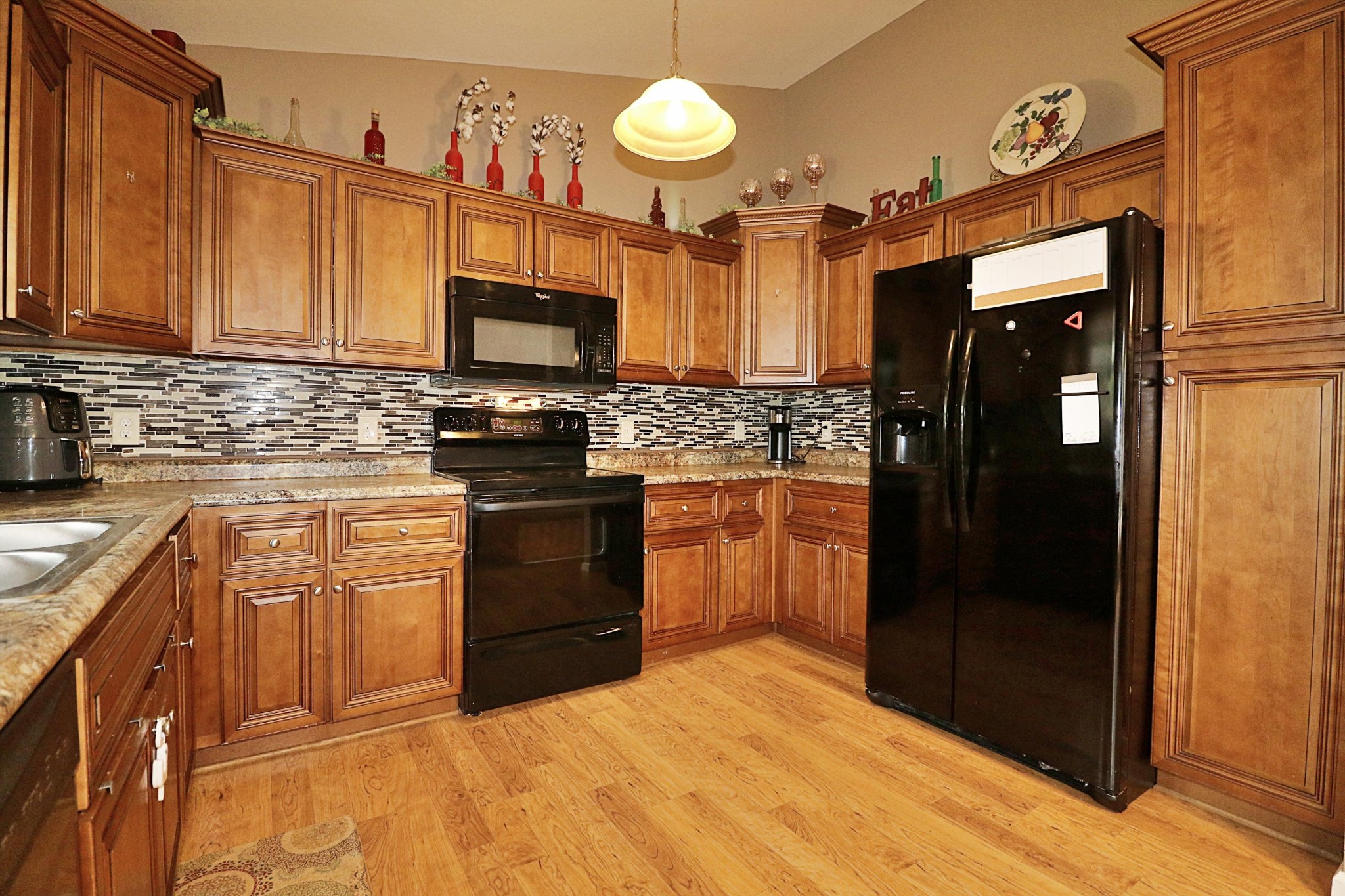1110 Toomey Road Oneida, TN 37841 - Photo 12 of 30 a kitchen with stainless steel appliances granite countertop a refrigerator stove and sink