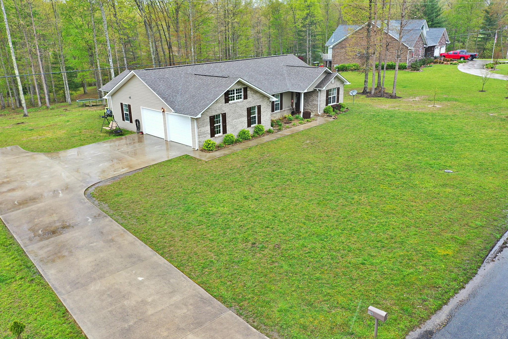 1110 Toomey Road Oneida, TN 37841 - Photo 20 of 30 a view of a house with a big yard plants and large trees