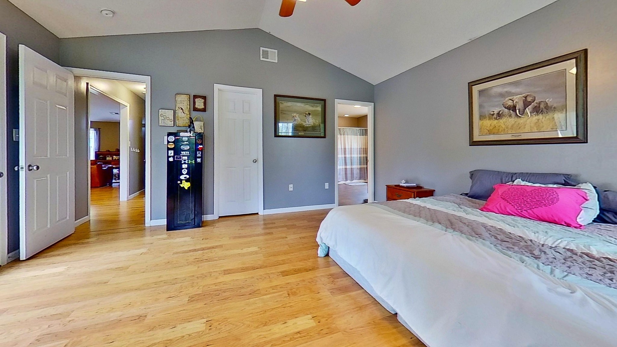1110 Toomey Road Oneida, TN 37841 - Photo 23 of 30 a bedroom with a bed and a chandelier