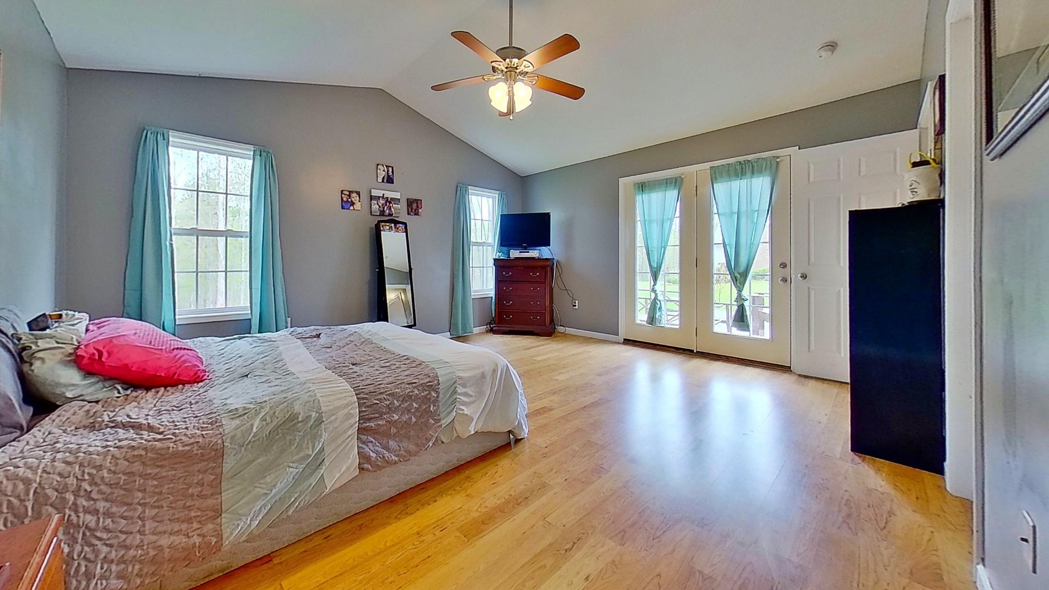 1110 Toomey Road Oneida, TN 37841 - Photo 24 of 30 a bedroom with bed and a chandelier
