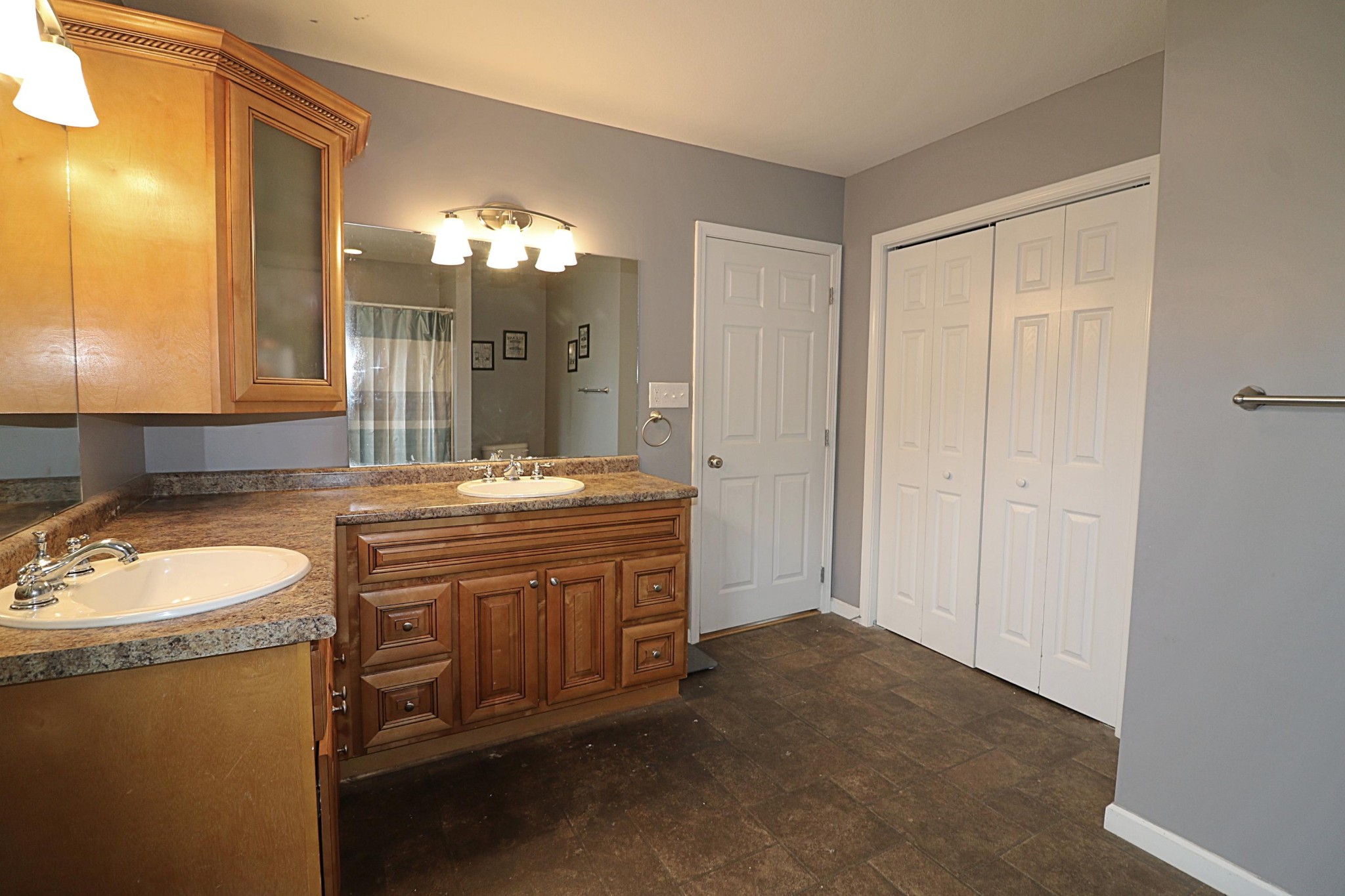 1110 Toomey Road Oneida, TN 37841 - Photo 26 of 30 a bathroom with a granite countertop sink and a mirror