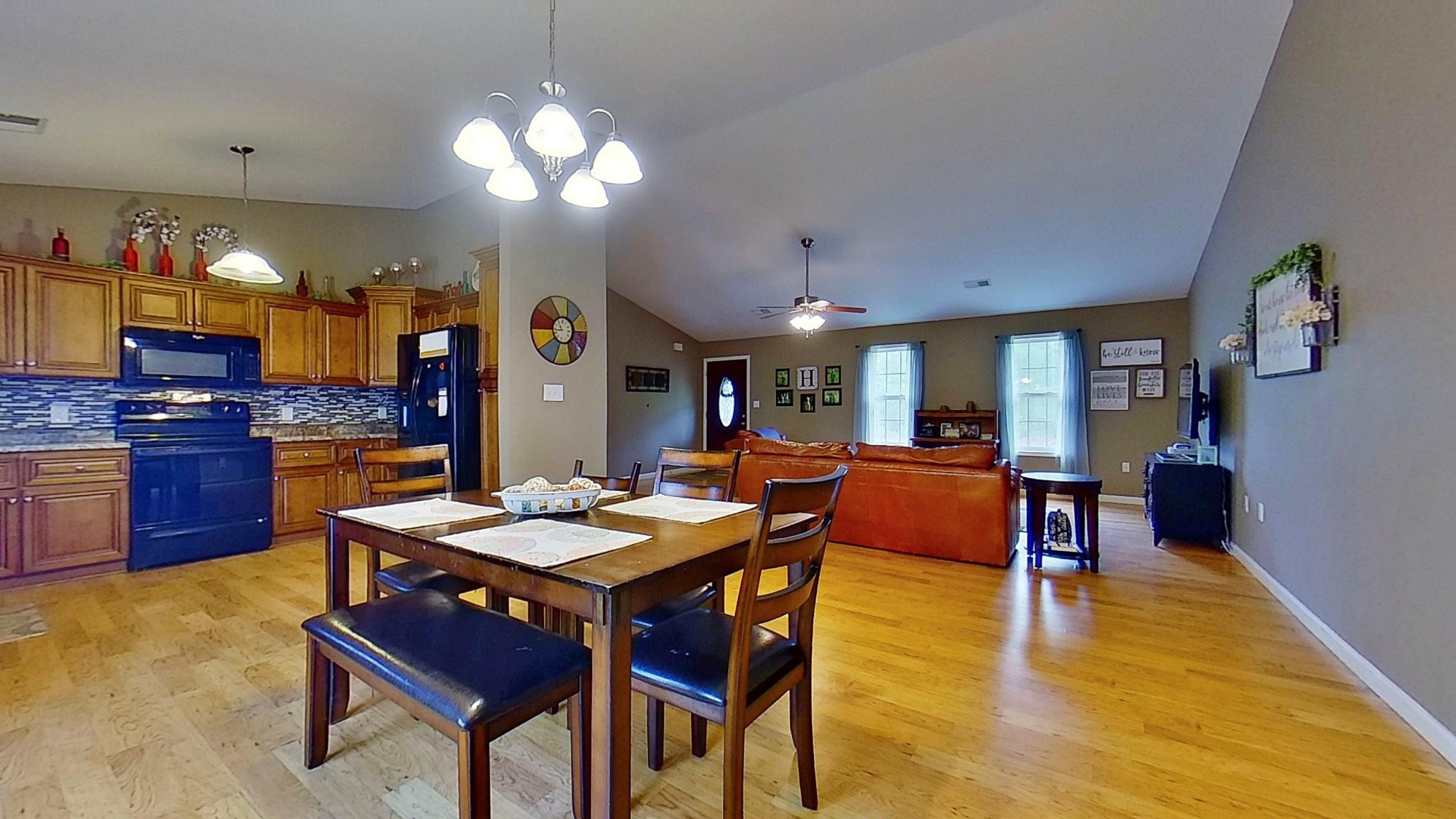 1110 Toomey Road Oneida, TN 37841 - Photo 9 of 30 a view of a dining room with furniture and wooden floor