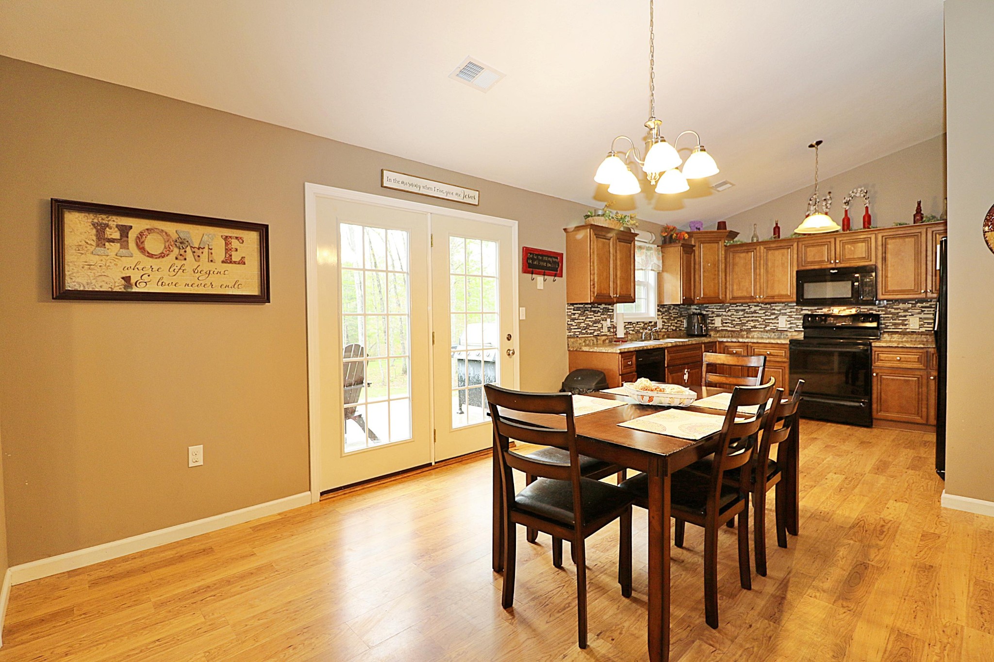 1110 Toomey Road Oneida, TN 37841 - Photo 10 of 30 a view of a dining room with furniture window and wooden floor