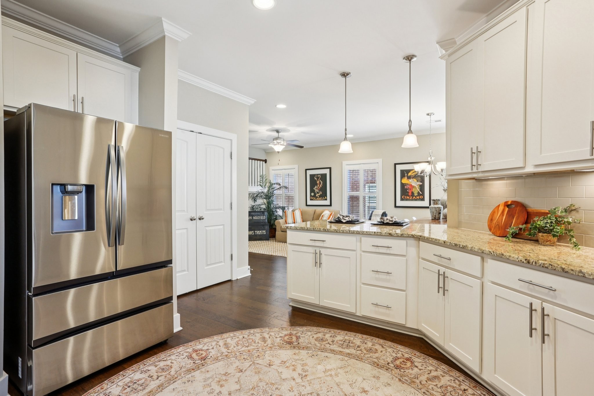 3014 Mainstream Drive Franklin, TN 37064 - Photo 22 of 69 a kitchen with stainless steel appliances granite countertop a refrigerator a sink and white cabinets