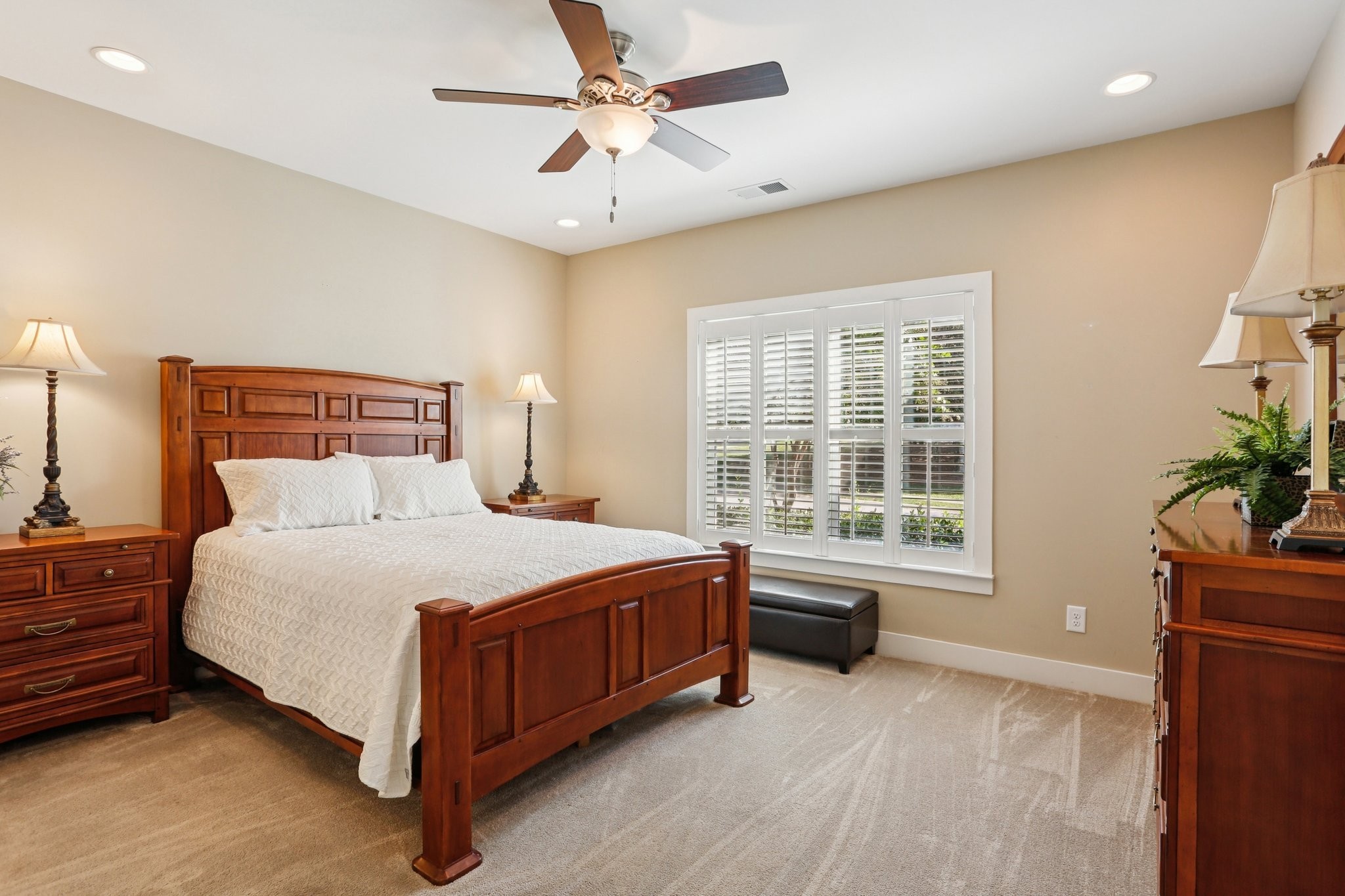 3014 Mainstream Drive Franklin, TN 37064 - Photo 23 of 69 a bedroom with a bed dresser and a chair