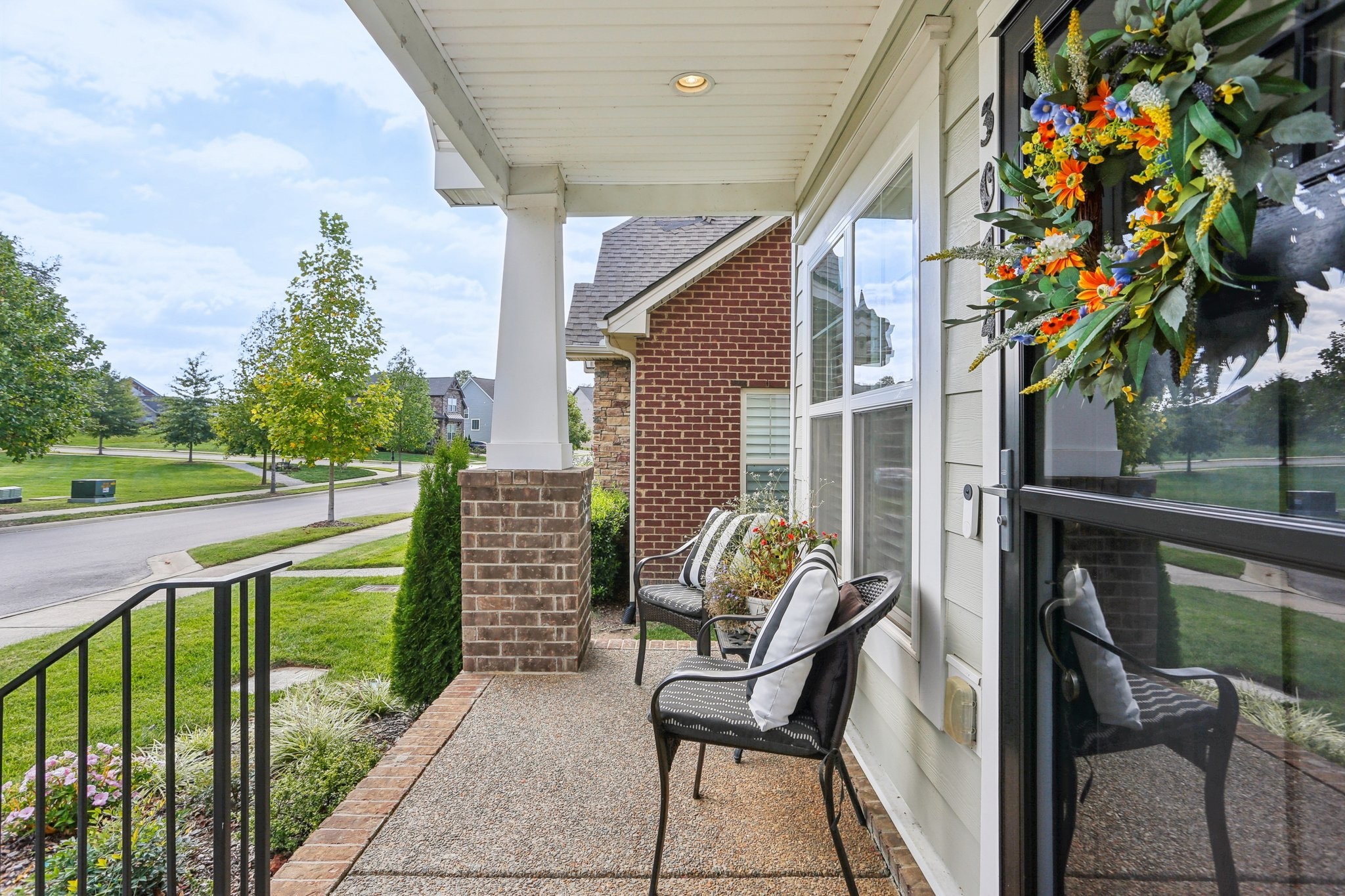 3014 Mainstream Drive Franklin, TN 37064 - Photo 4 of 69 a balcony view with a garden