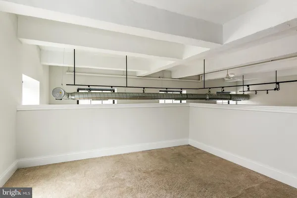 a kitchen with stainless steel appliances a sink and a counter