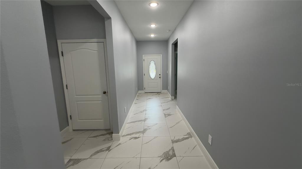 706 South Thacker Avenue Kissimmee, FL 34741 - Photo 23 of 36 a view of a hallway