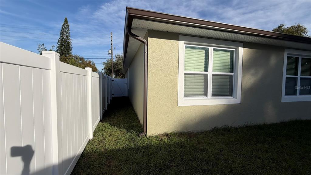 706 South Thacker Avenue Kissimmee, FL 34741 - Photo 6 of 36 a house view with a backyard space
