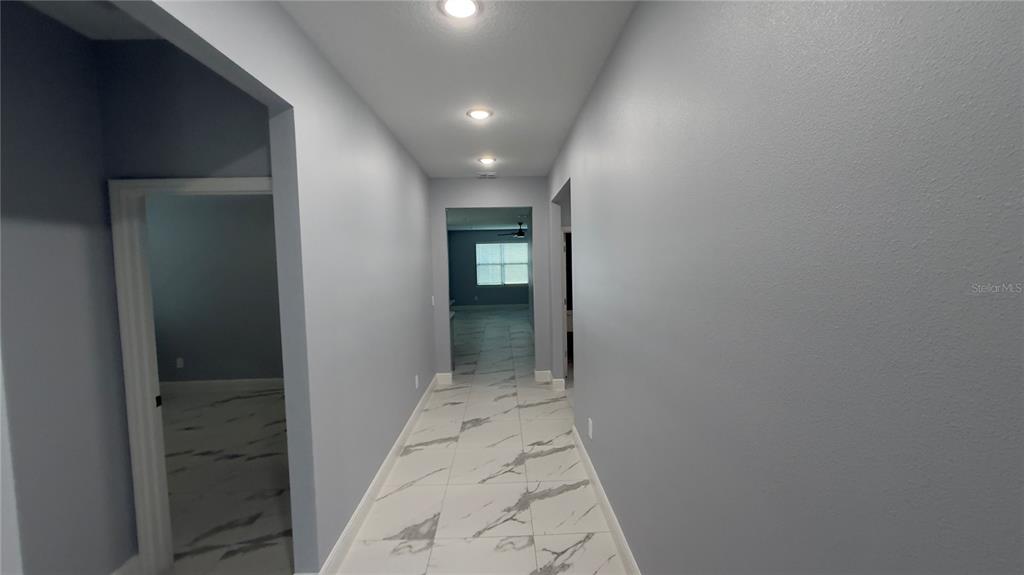 706 South Thacker Avenue Kissimmee, FL 34741 - Photo 9 of 36 wooden floor in a gallery