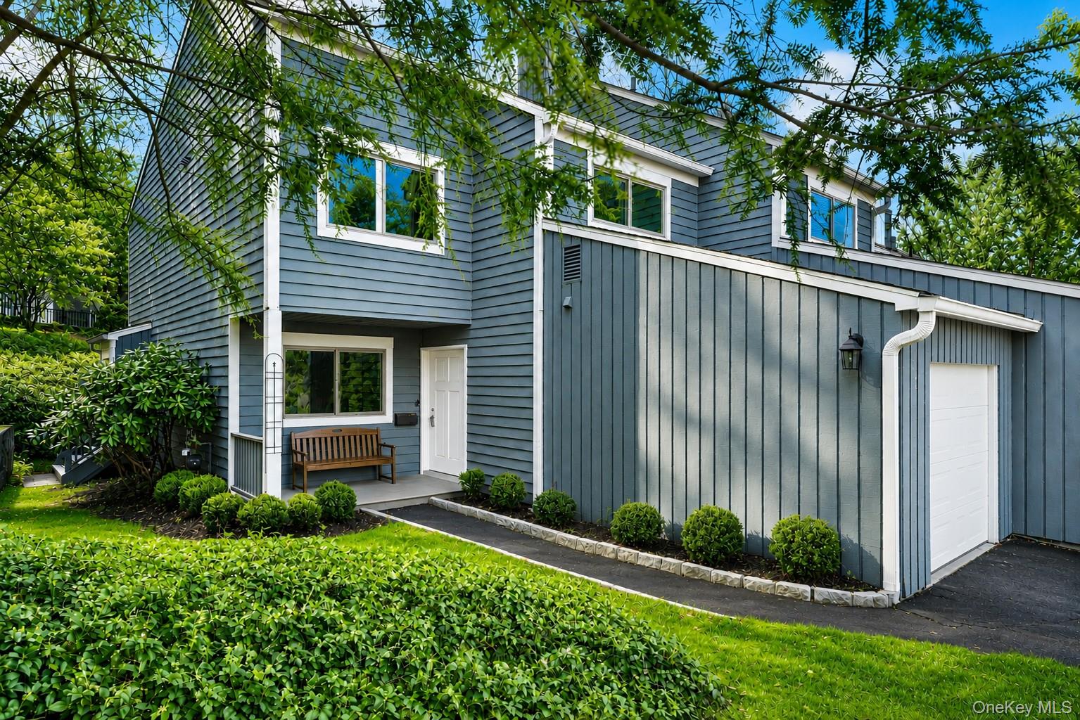 Welcome to 42 Timber Ridge...The Hidden Jewel of Mount Kisco  A Desirable 3 bedroom corner unit with Garage!