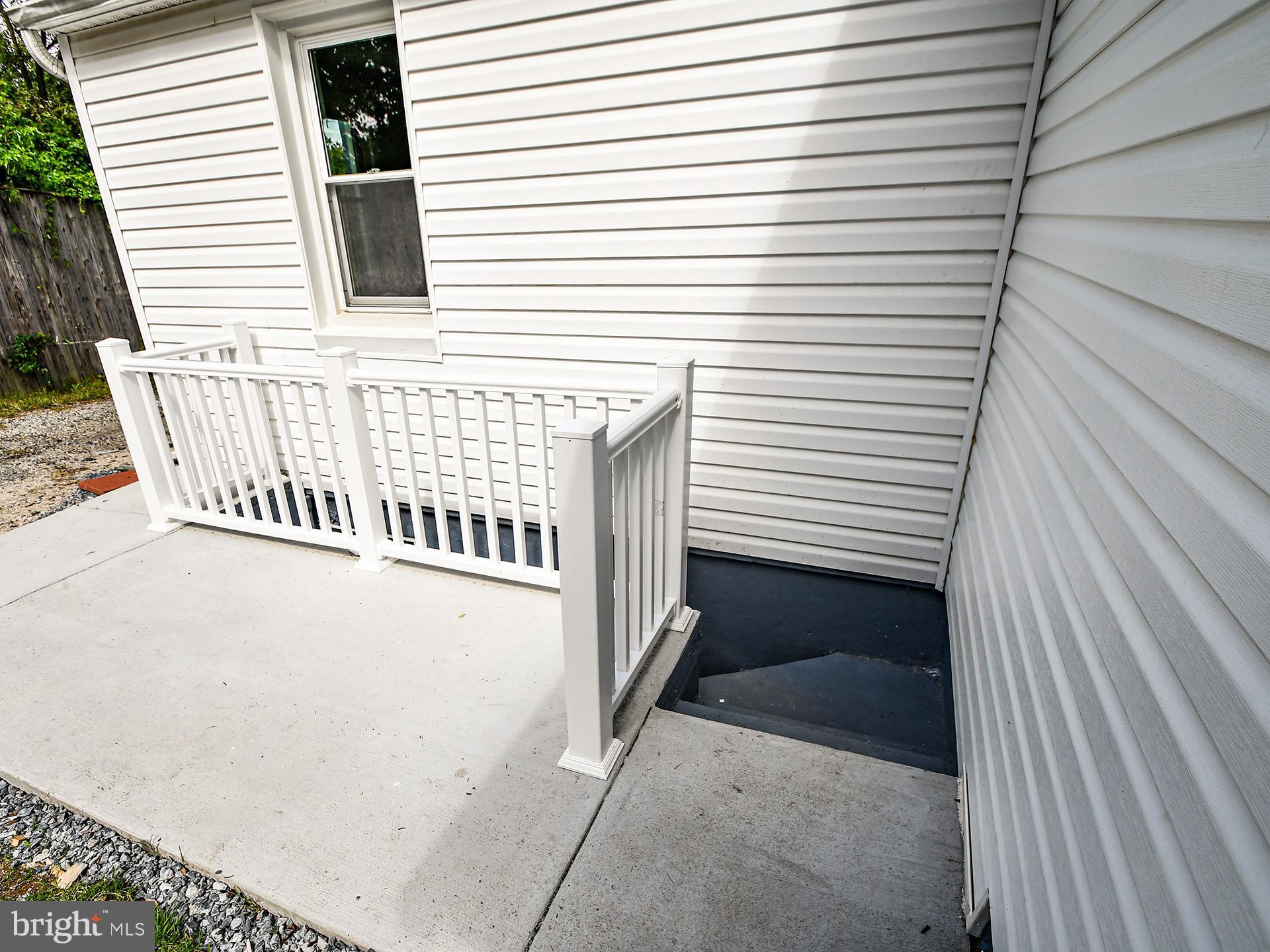 827 Queenstown Road Severn, MD 21144 - Photo 8 of 59 Rear basemant entrance