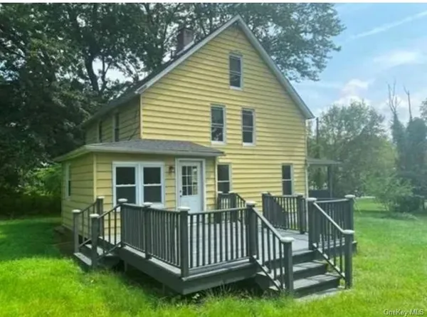 a view of a house with a deck