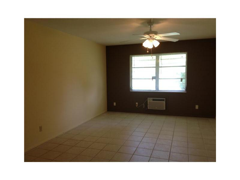 1150 East Sample Road, Unit 109B Pompano Beach, FL 33064 - Photo 2 of 3 Exterior Front