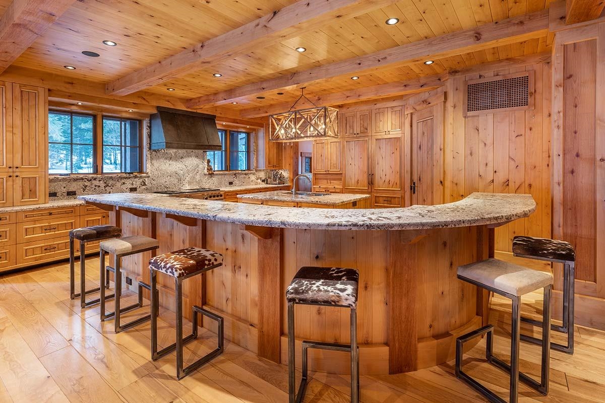 8458 Valhalla Drive Truckee, CA 96161 - Photo 7 of 20 a view of a dining room with furniture and wooden floor