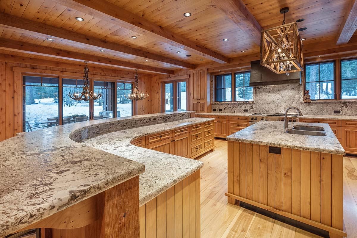 8458 Valhalla Drive Truckee, CA 96161 - Photo 8 of 20 a kitchen with a sink a counter top space and stainless steel appliances
