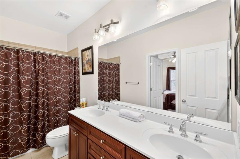 2660 Colgan Court Southeast Atlanta, GA 30317 - Photo 33 of 50 a bathroom with a sink toilet and shower