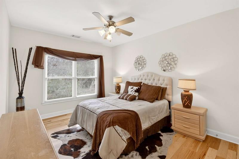 2660 Colgan Court Southeast Atlanta, GA 30317 - Photo 36 of 50 a bedroom with a large bed and a window