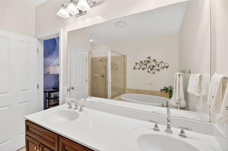 2660 Colgan Court Southeast Atlanta, GA 30317 - Photo 39 of 50 a bathroom with a sink vanity and a mirror