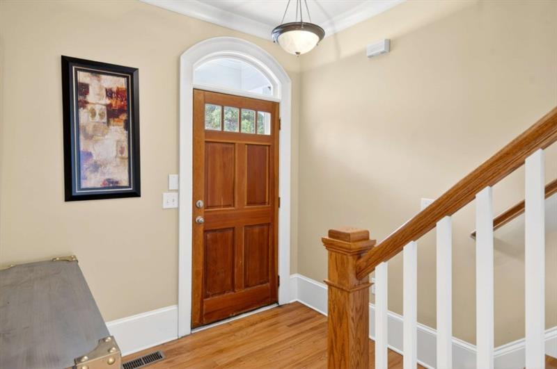 2660 Colgan Court Southeast Atlanta, GA 30317 - Photo 7 of 50 a view of front door with hallway and wooden floor