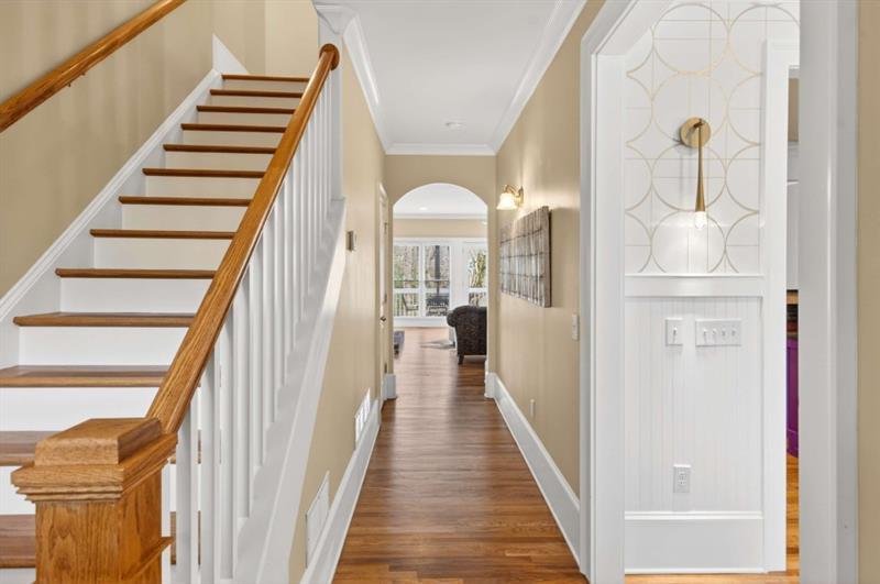 2660 Colgan Court Southeast Atlanta, GA 30317 - Photo 10 of 50 a view of a hallway with wooden floor and staircase
