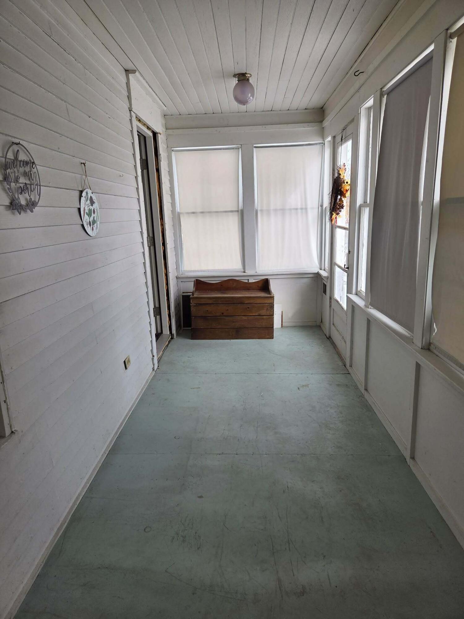 8 Edes Avenue Dover-Foxcroft, ME 04426 - Photo 21 of 47 glassed-in porch