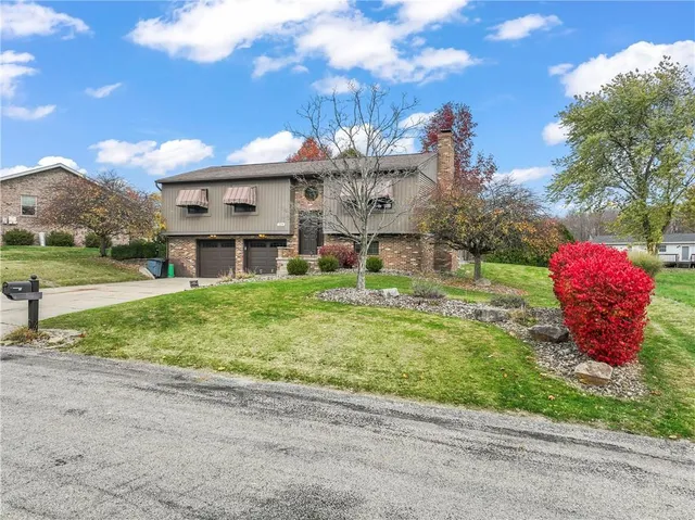 a view of a house with a garden