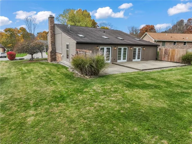 a view of a house with a garden