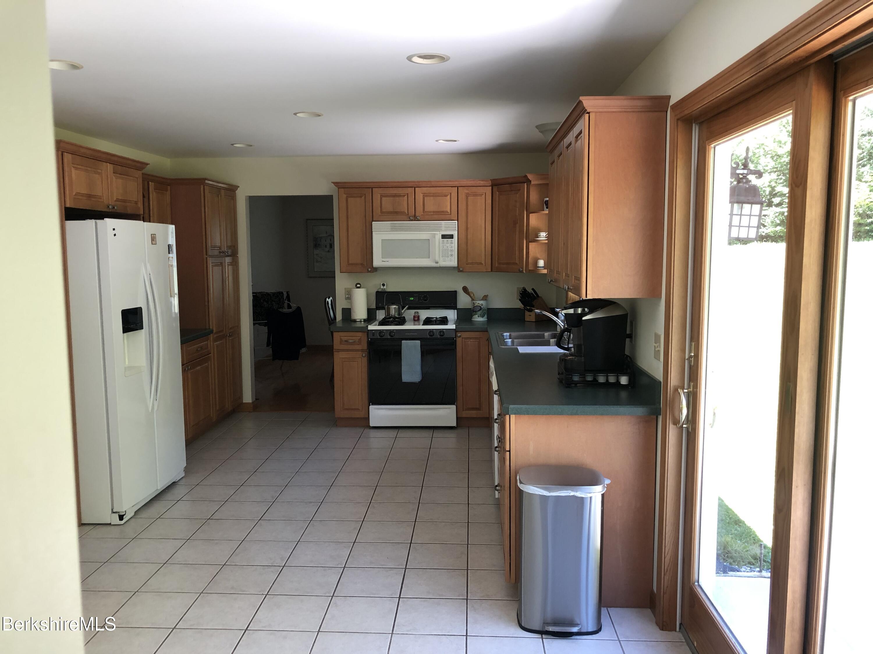 1387 East Windsor Road Windsor, MA 01270 - Photo 11 of 38 a kitchen with a refrigerator and a sink