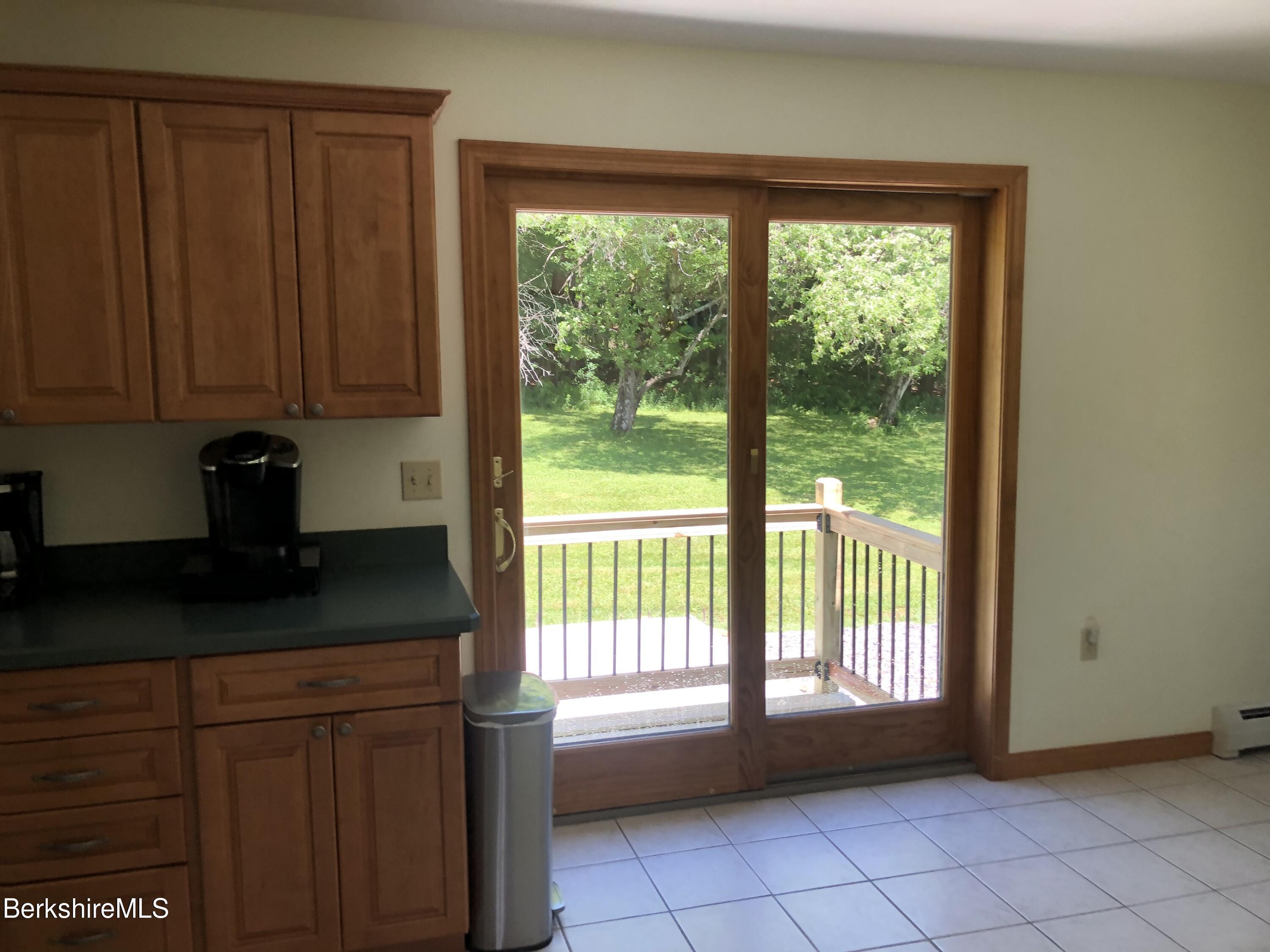 1387 East Windsor Road Windsor, MA 01270 - Photo 12 of 38 a view of a kitchen that has a sink and a stove