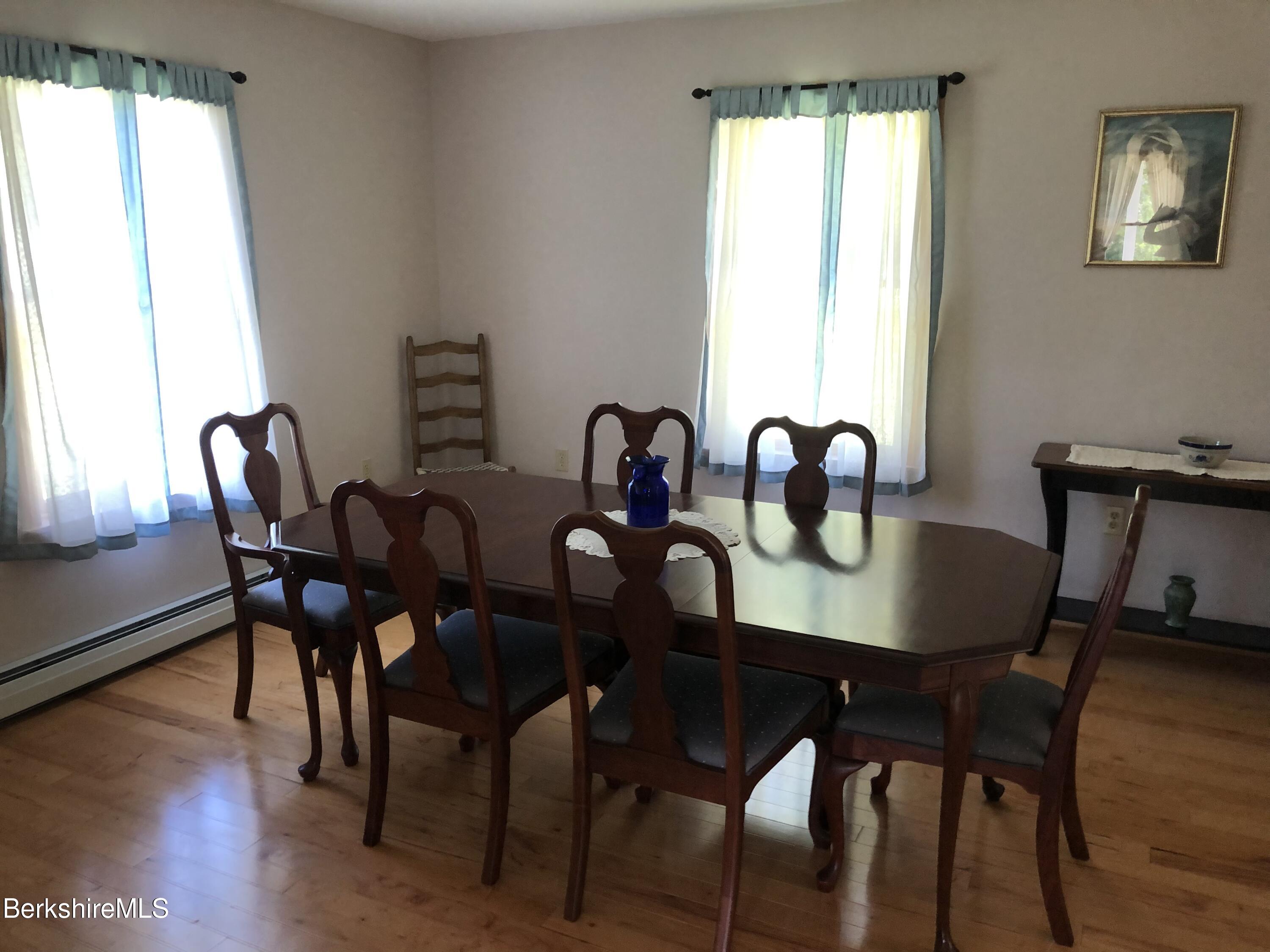 1387 East Windsor Road Windsor, MA 01270 - Photo 13 of 38 a view of a dining room with furniture and window