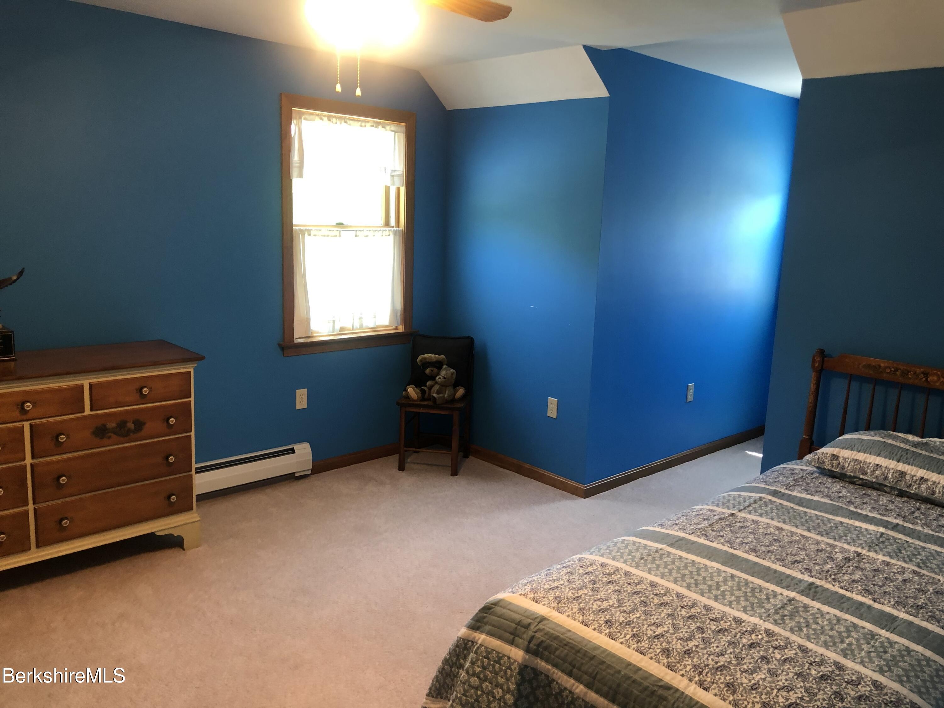1387 East Windsor Road Windsor, MA 01270 - Photo 30 of 38 a bedroom with a bed and a window