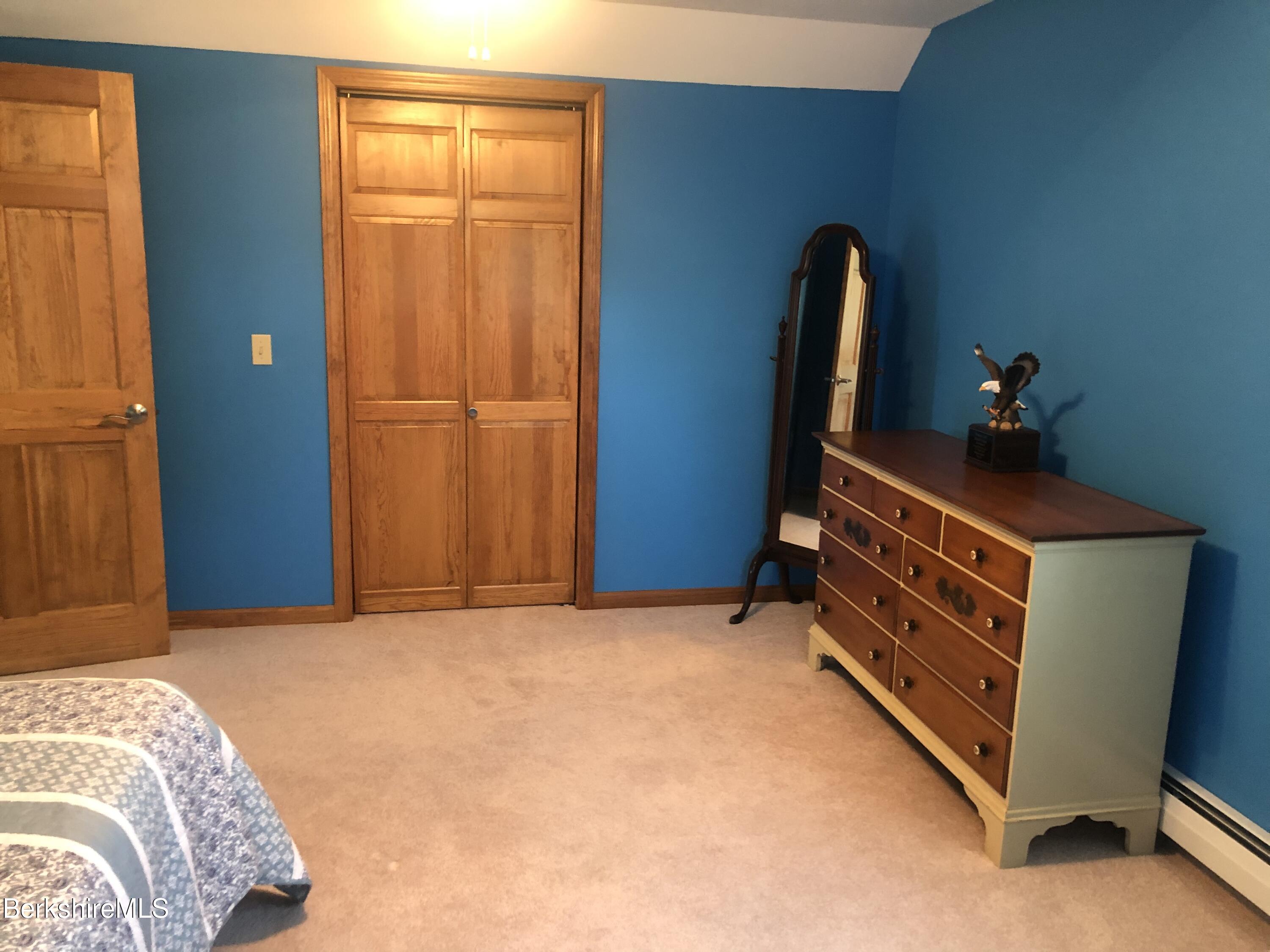 1387 East Windsor Road Windsor, MA 01270 - Photo 32 of 38 a bedroom with a bed and a dresser