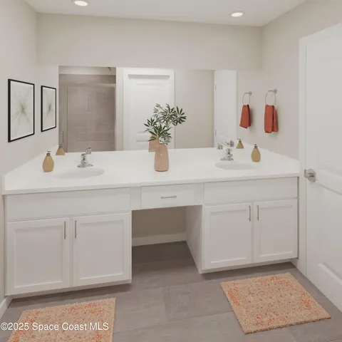 a bathroom with a sink vanity and mirror