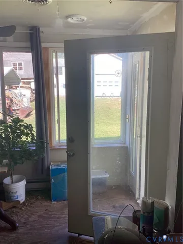 a room with furniture and a window