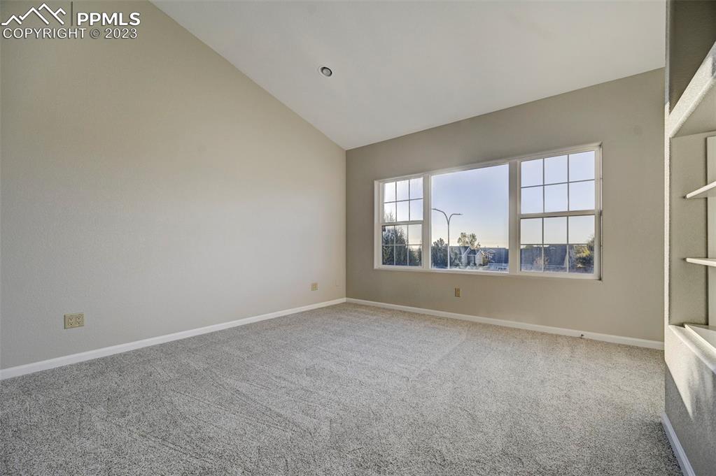 5433 Prominence Point Colorado Springs, CO 80923 - Photo 19 of 26 a view of an empty room with a window