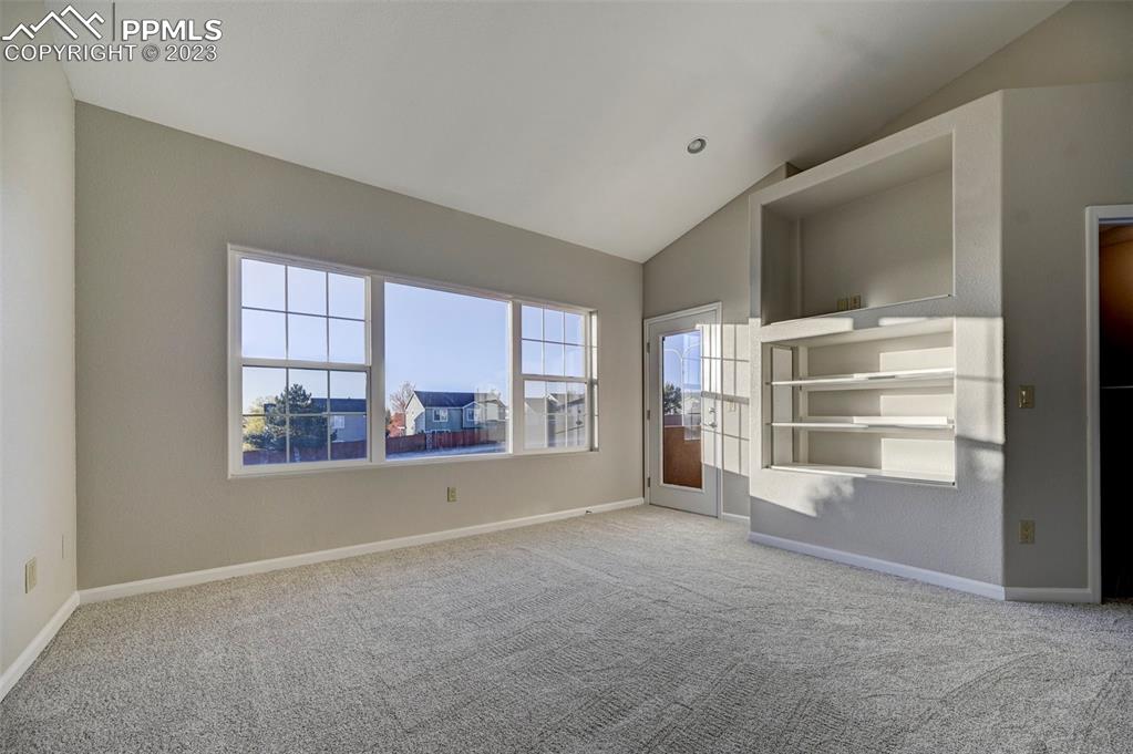 5433 Prominence Point Colorado Springs, CO 80923 - Photo 20 of 26 an empty room with windows