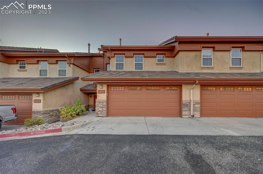 5433 Prominence Point Colorado Springs, CO 80923 - Photo 2 of 26 front view of a house