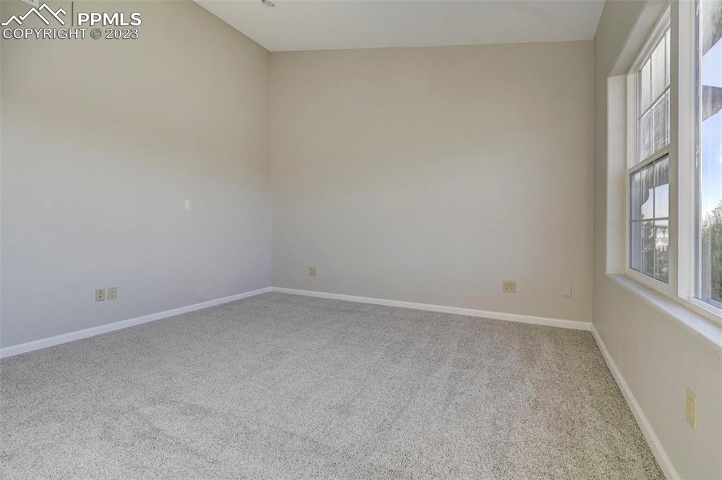 5433 Prominence Point Colorado Springs, CO 80923 - Photo 22 of 26 an empty room with a window