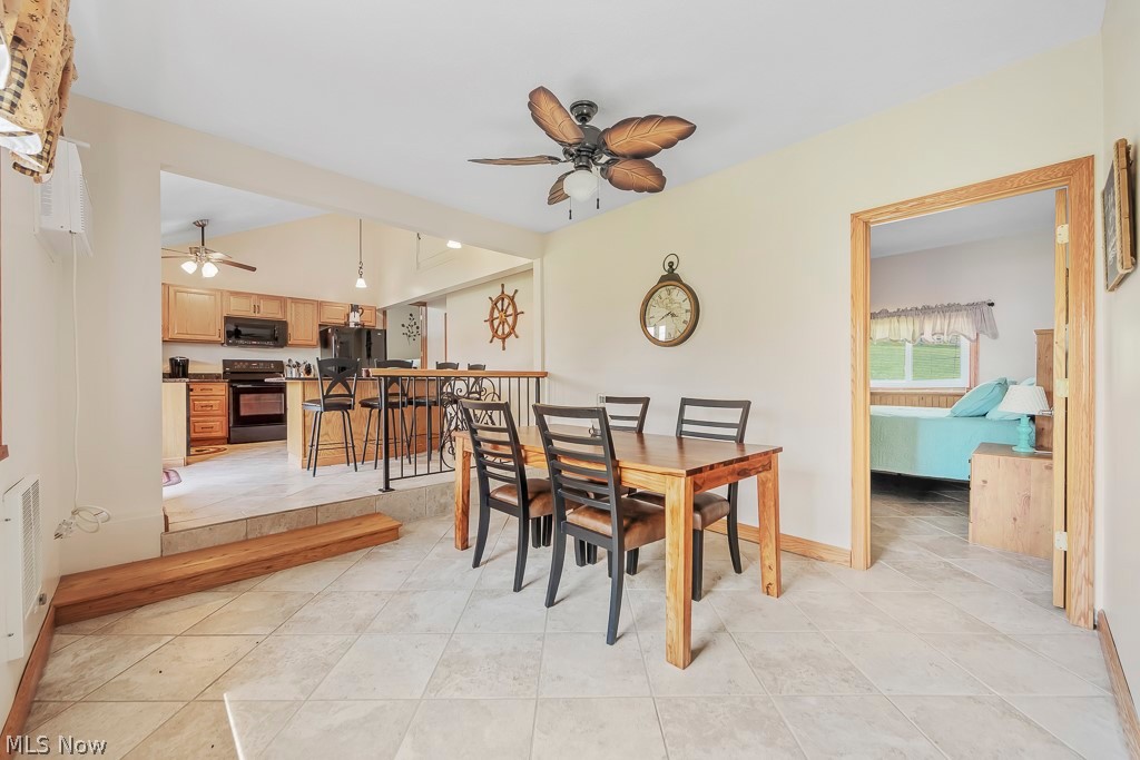 6939 Lakeview Road Hanoverton, OH 44423 - Photo 13 of 42 Cermaic tiled dining room with ceiling fan