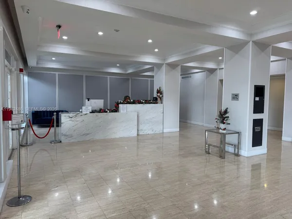 a room with lots of flower plants