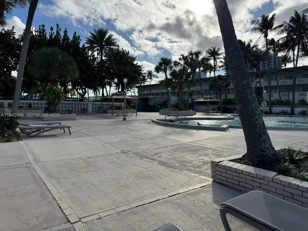 a view of water with an aerial of a house